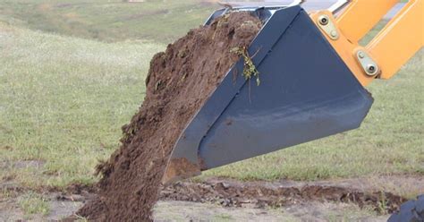 how much does a skid steer bucket of gravel weigh|skid steer bucket struck capacity.